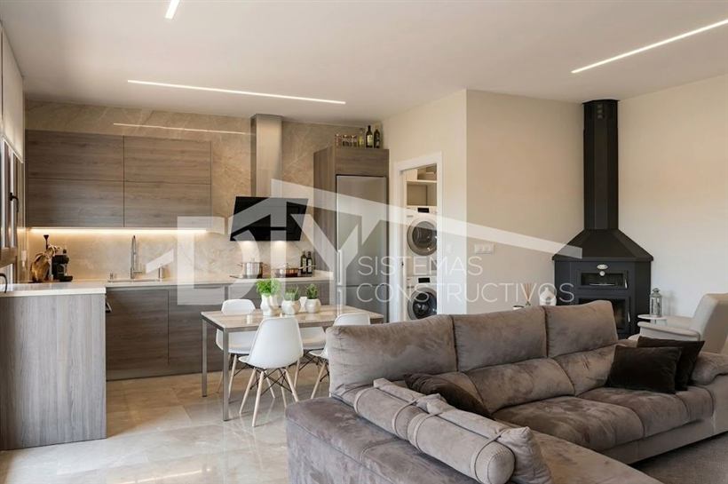 Salón-cocina abierto de una casa DIY